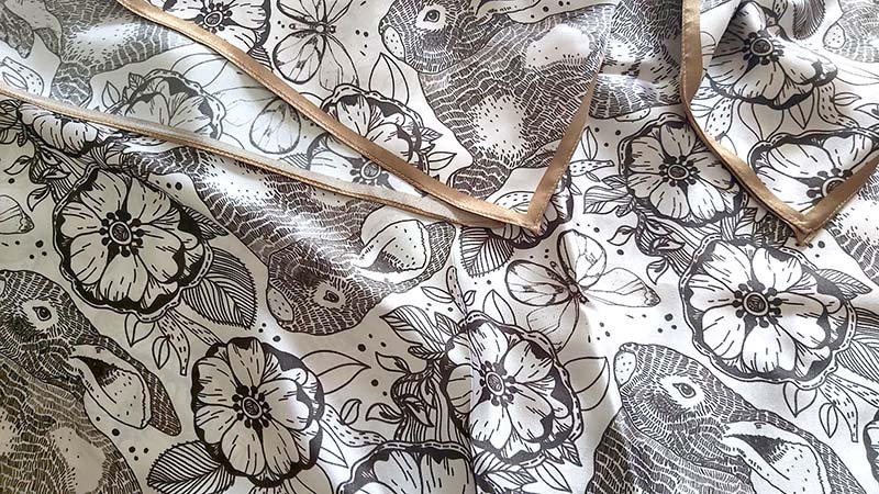 silk scarves with a bunny print and brown borders