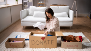 woman decluttering and donating home